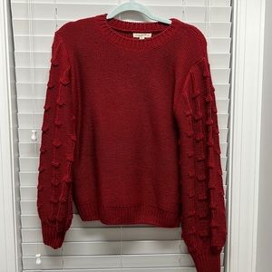 Dark red sweater